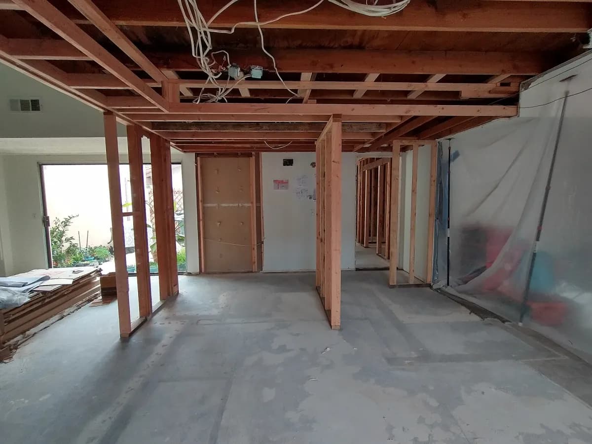 Room under refurbishment with open timber studwork
